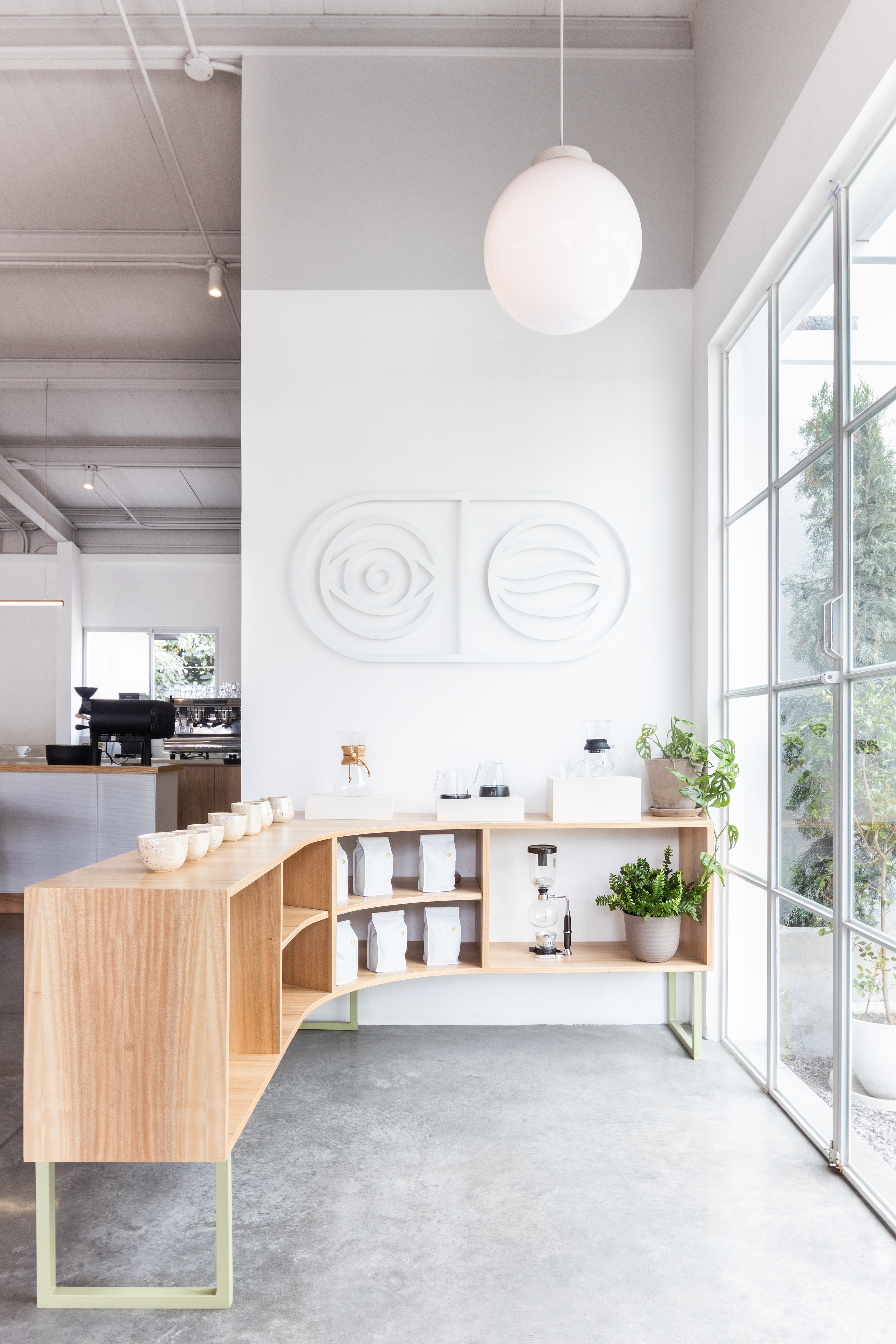 Coffee Relief Tumbaco interior developed with Made by AOS using wood and natural light