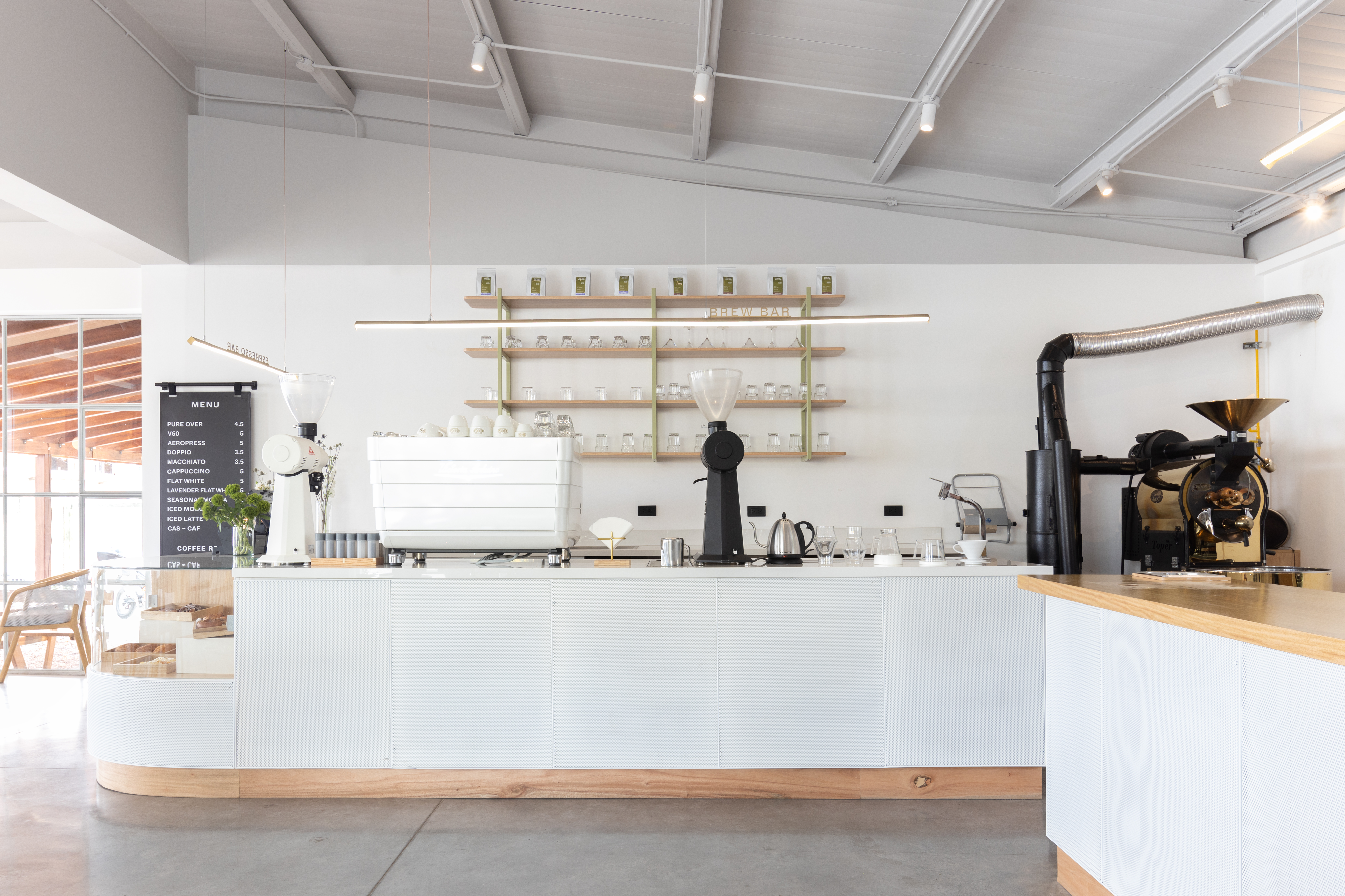 Specialty coffee bar inside Coffee Relief Tumbaco near Quito
